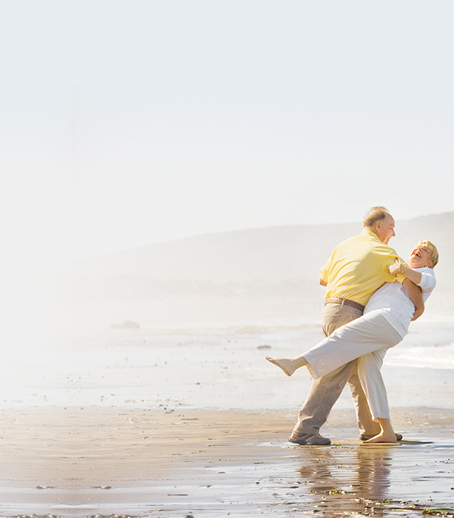 Couple dancing on the beach